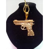 Amuleto Pistola Metal Dorada  4 cm